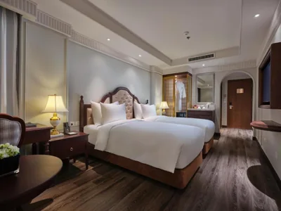 Colonial Deluxe doppia con letti singoli e finestra interna — GRAND HOTEL du LAC Hanoi