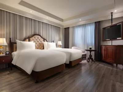 Colonial Executive doppia con letti singoli e finestra interna — GRAND HOTEL du LAC Hanoi